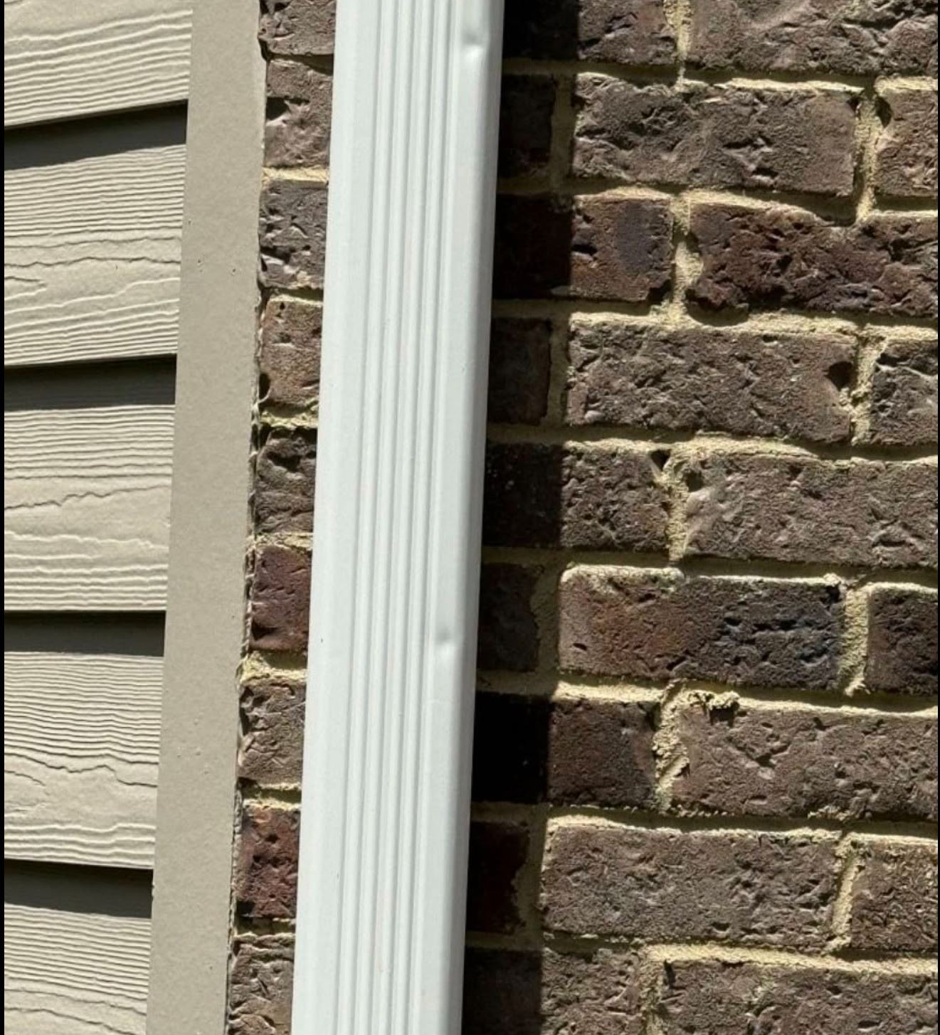 Professional gutter downspout installation in Johns Creek, GA — Supreme Roofing and Reconstruction